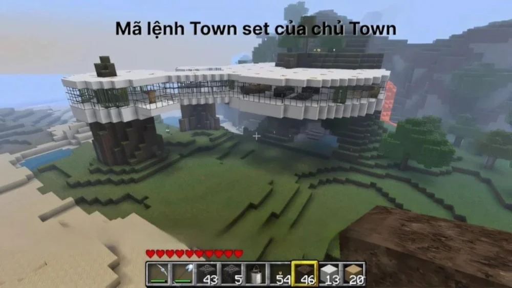 Dùng lệnh town set taxes spawn và name để cấu hình Town