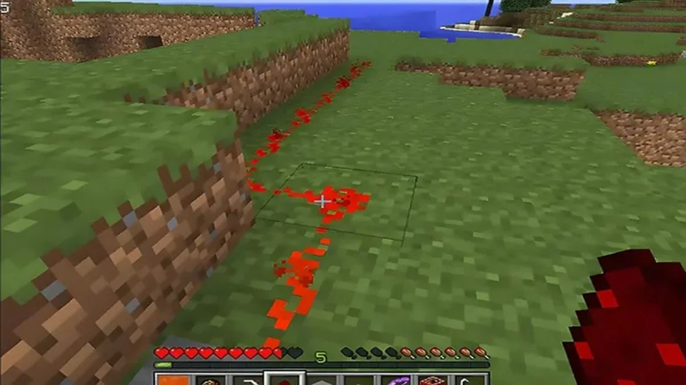 Đặt công tắc trải dây Redstone nối TNT kích hoạt từ xa